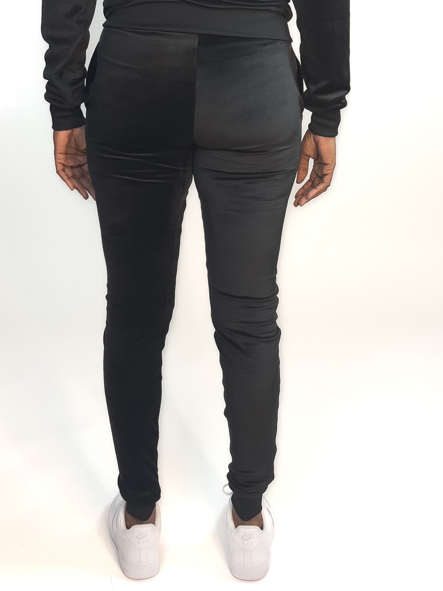 Soft black velour pants designed for tall women and girls with extended length, offering a comfortable and trendy fit.